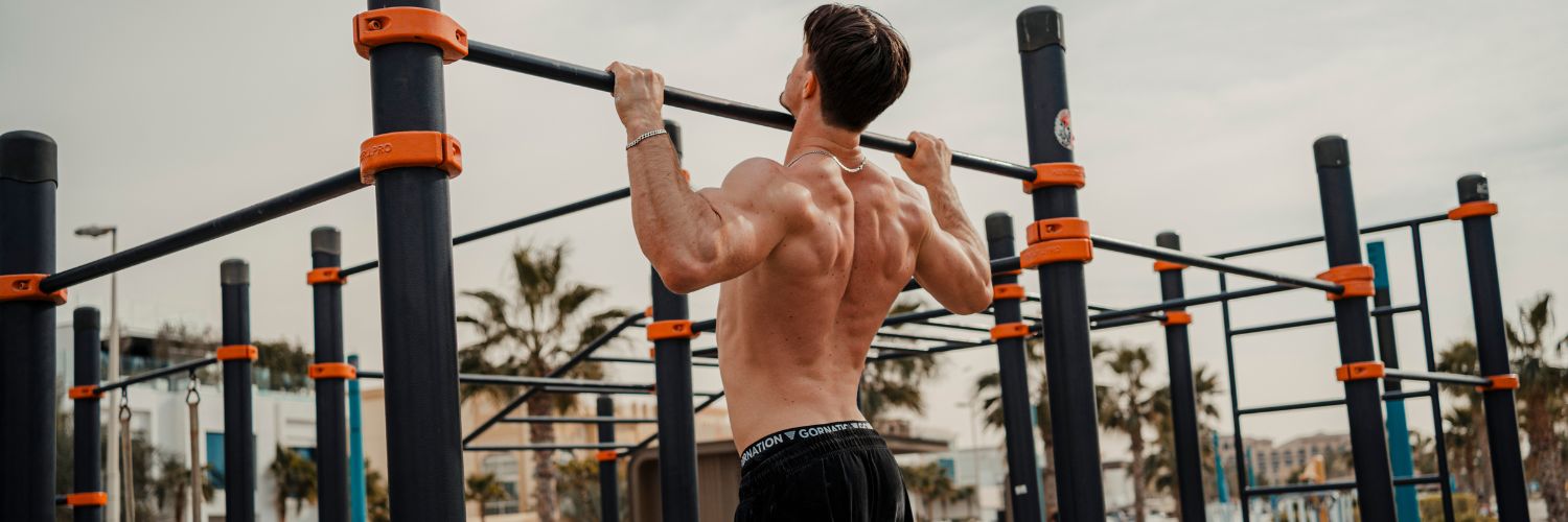 GORNATION athlete performs pull up in calisthenics park