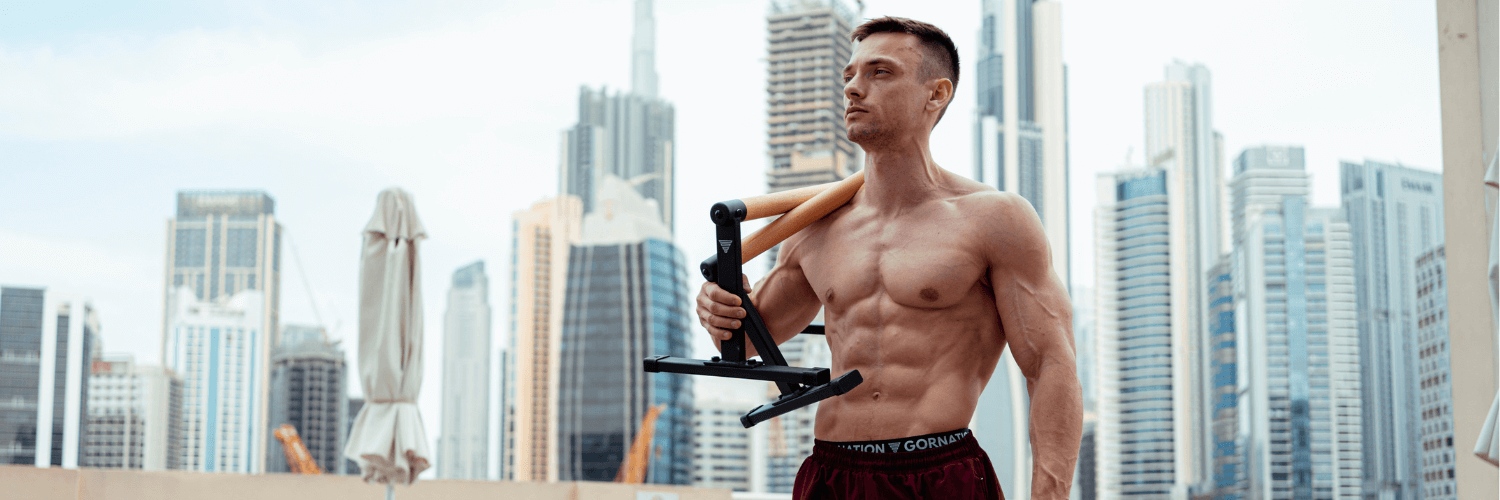 Max True posing with the GORNATION Parallettes in Dubai