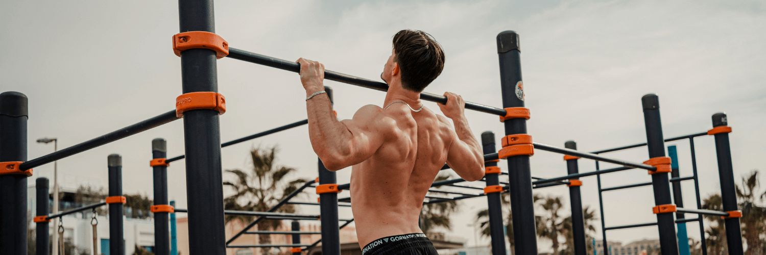 Simon Imhäuser performing a Pull Up in a calisthenics park