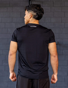 GORNATION athlete wearing the GORNATION active t-shirt in black