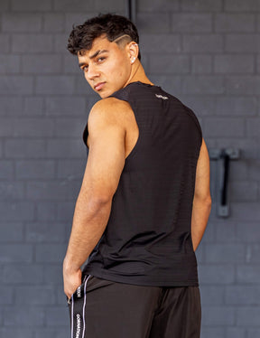 GORNATION athlete wearing the GORNATION active tank top in black