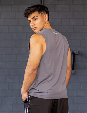 GORNATION athlete wearing the GORNATION active tank top in grey