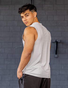 GORNATION athlete wearing the GORNATION active tank top in grey