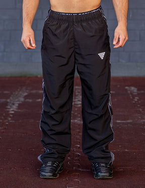 GORNATION athlete wearing the GORNATION tracksuite pants in black