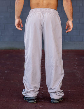 GORNATION athlete wearing the GORNATION tracksuite pants in grey