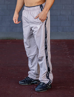 GORNATION athlete wearing the GORNATION tracksuite pants in grey