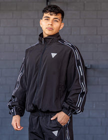GORNATION athlete wearing the GORNATION tracksuite jacket in black