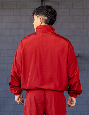 GORNATION athlete wearing the GORNATION tracksuite in red