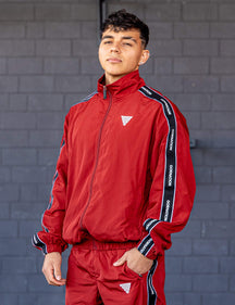 GORNATION athlete wearing the GORNATION tracksuite in red