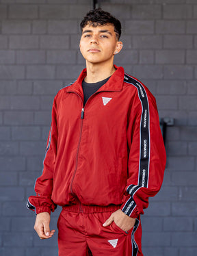 GORNATION athlete wearing the GORNATION tracksuite in red