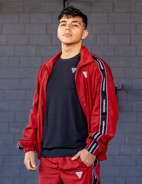 GORNATION athlete wearing the GORNATION tracksuite in red