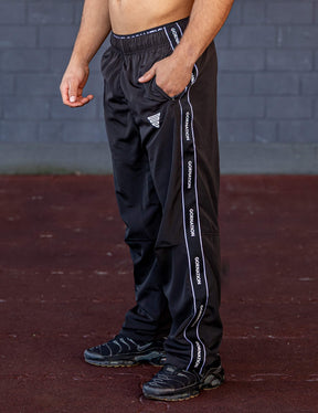 GORNATION athlete wearing the GORNATION tracksuite pants in black