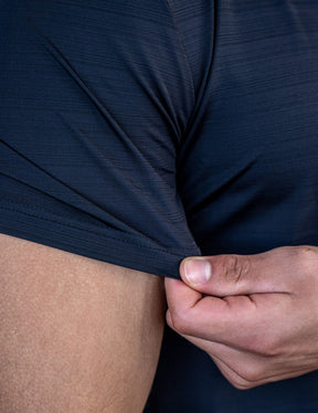 Close up of a GORNATION athlete wearing the GORNATION active t-shirt in black