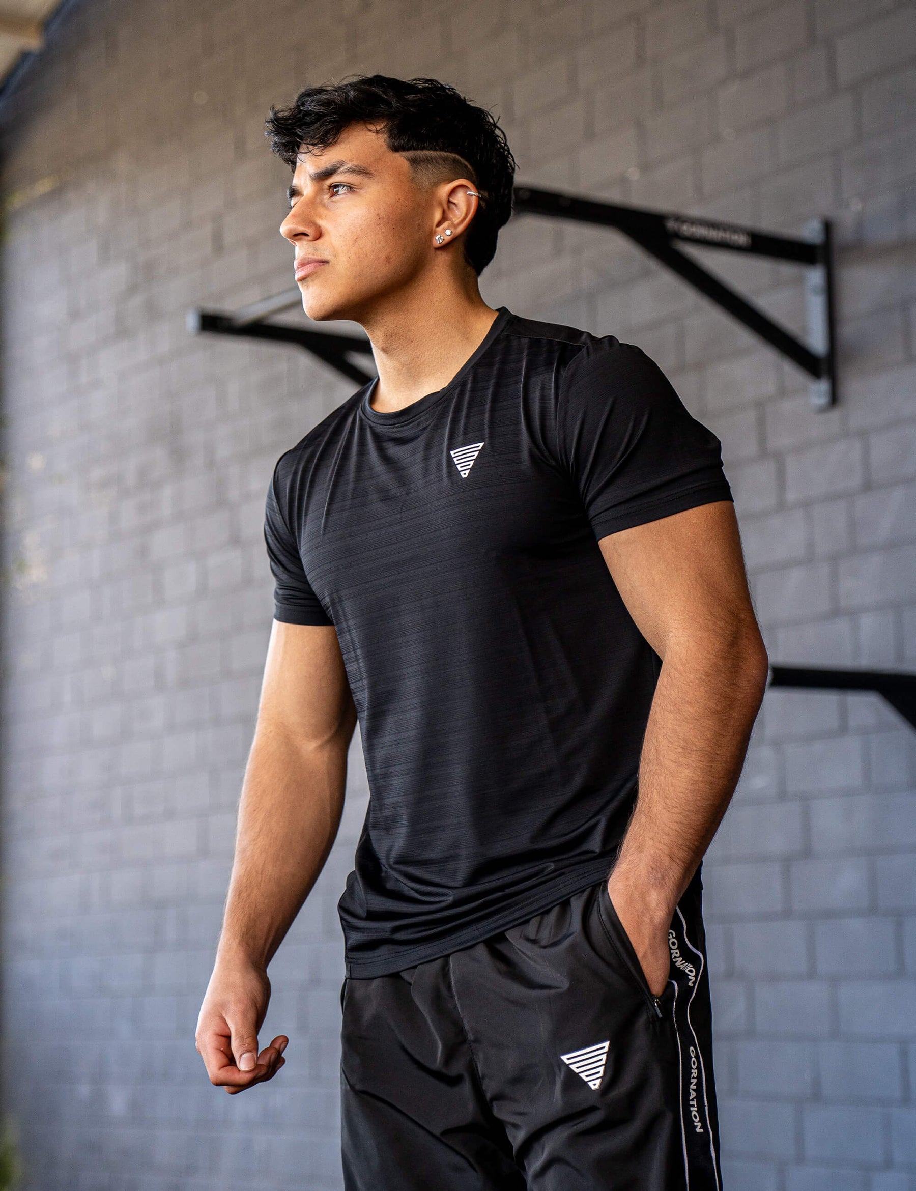 GORNATION athlete wearing the GORNATION active t-shirt in black