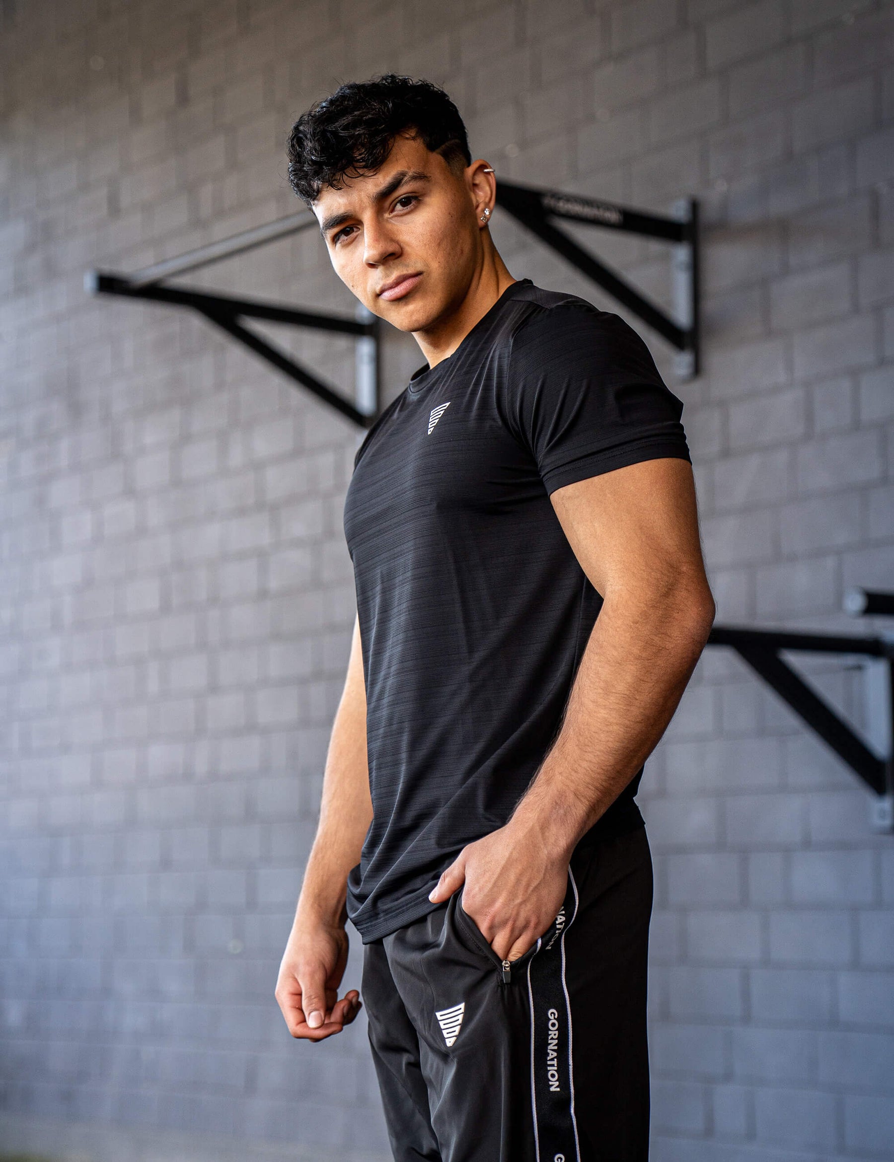 GORNATION athlete wearing the GORNATION active t-shirt in black