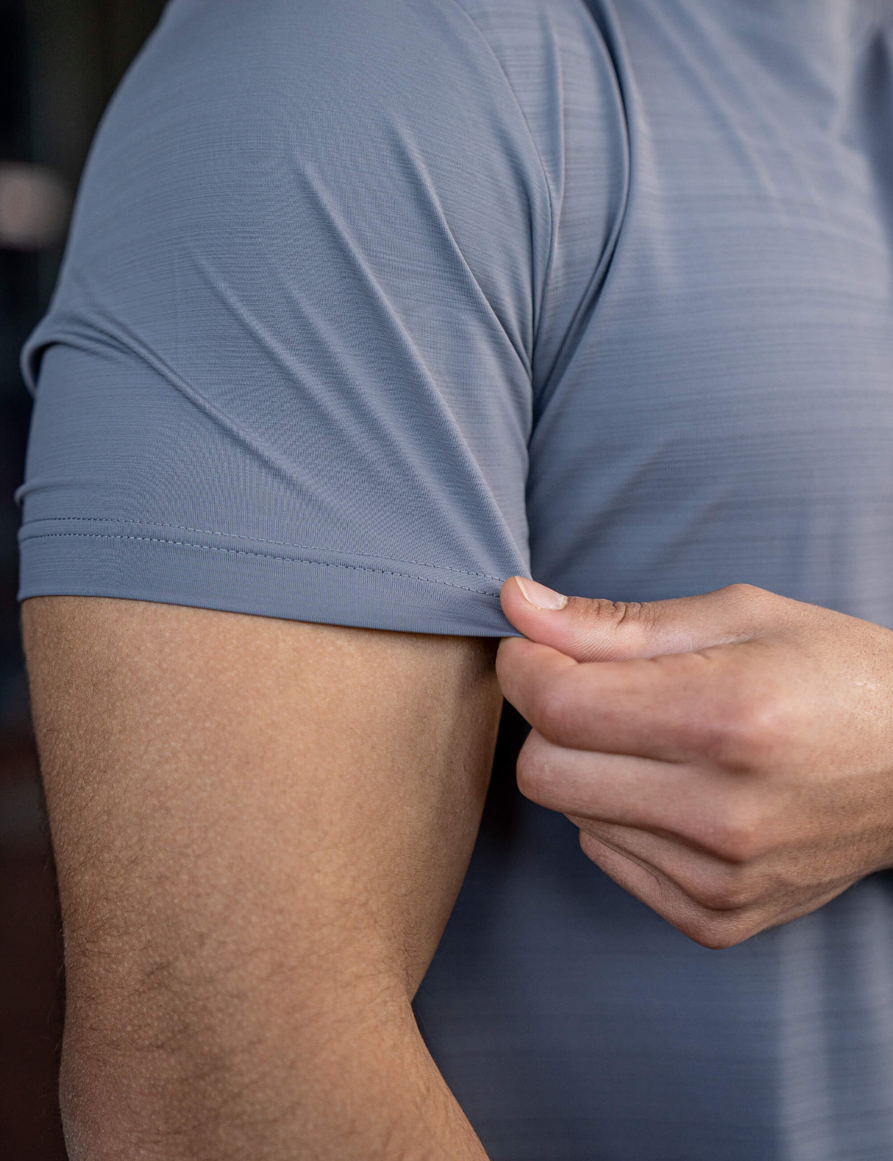 Close up of a GORNATION athlete wearing the GORNATION active t-shirt in grey