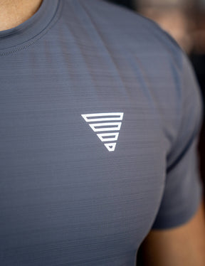 Close up of a GORNATION athlete wearing the GORNATION active t-shirt in grey