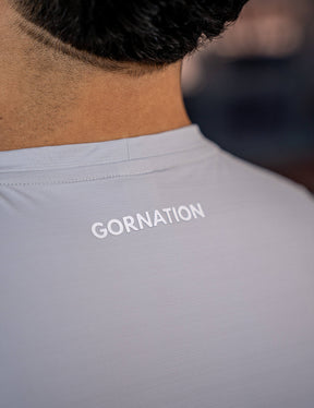 Close up of a GORNATION athlete wearing the GORNATION active t-shirt in grey