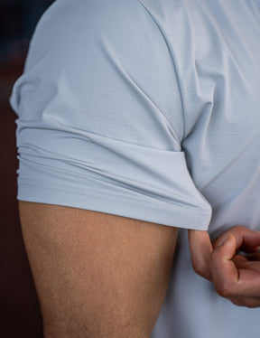Close up of a GORNATION athlete wearing the GORNATION active t-shirt in grey
