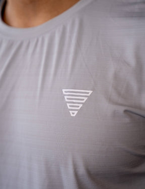 Close up of a GORNATION athlete wearing the GORNATION active t-shirt in grey