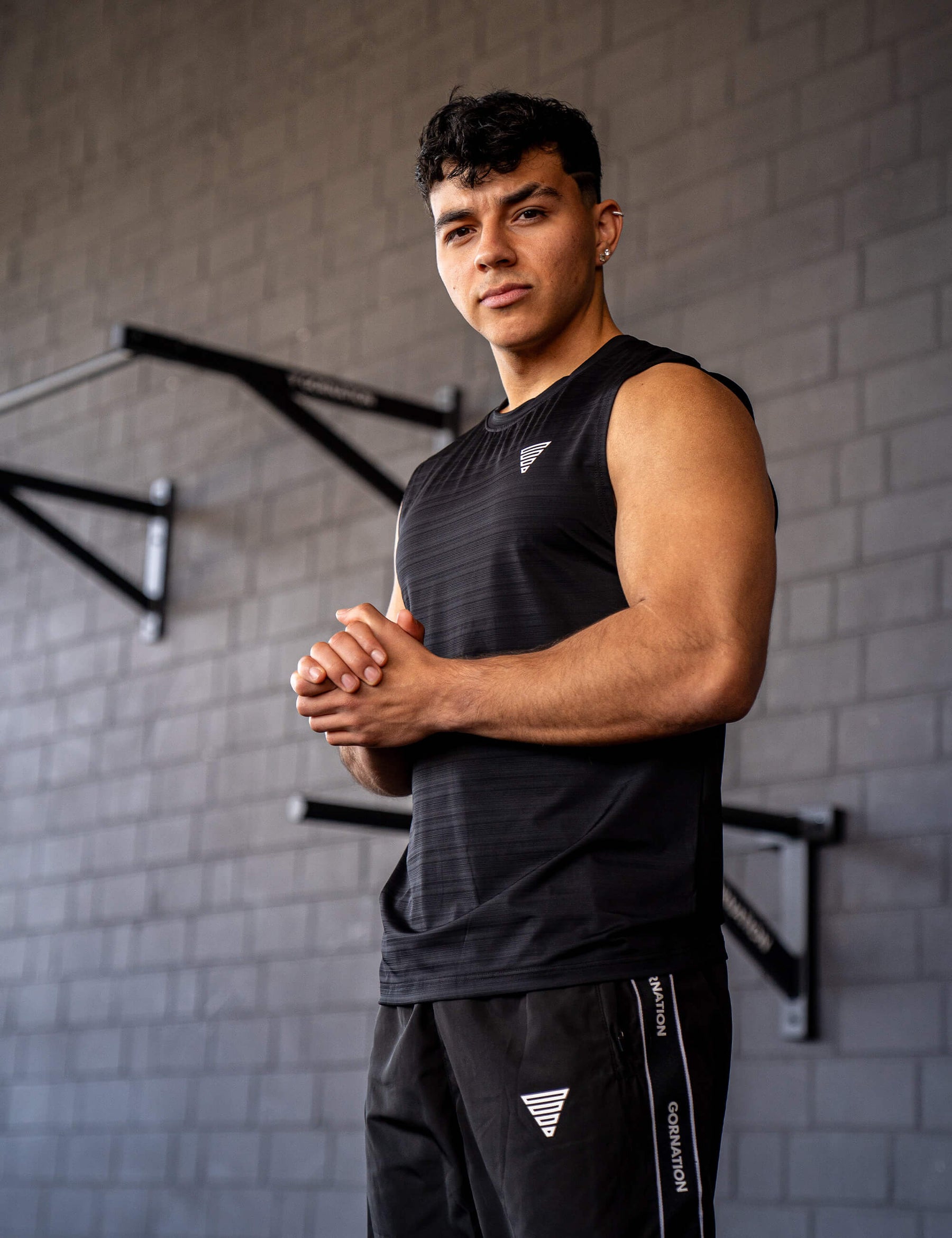 GORNATION athlete wearing the GORNATION active tank top in black