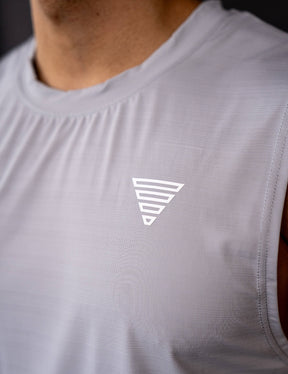 Close up of a GORNATION athlete wearing the GORNATION active tank top in grey