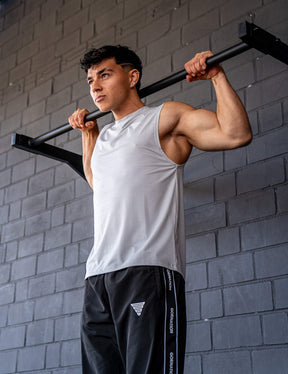 GORNATION athlete doing pull ups with a GORNATION pull up bar wearing an active tank top 
