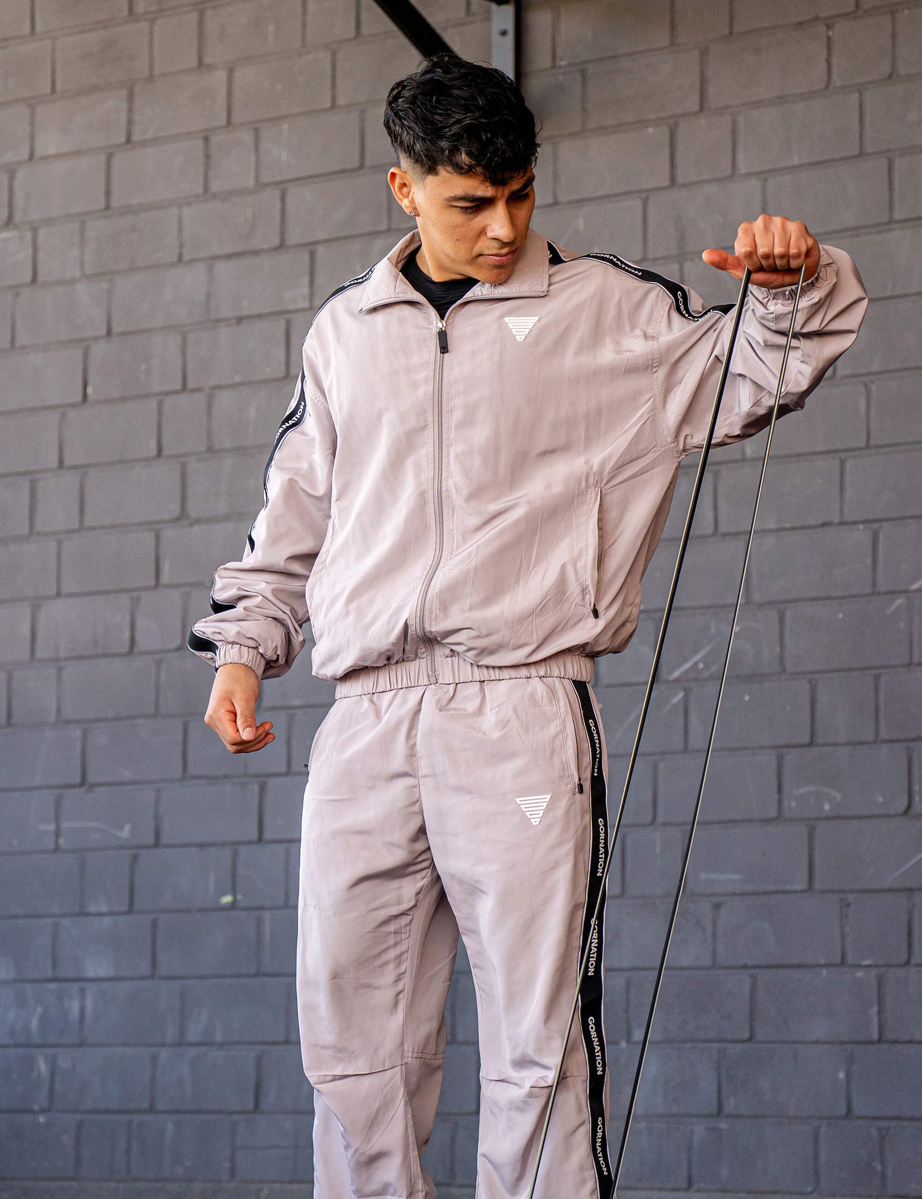 GORNATION athlete wearing the GORNATION tracksuite in grey