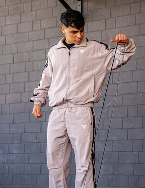 GORNATION athlete wearing the GORNATION tracksuite in grey