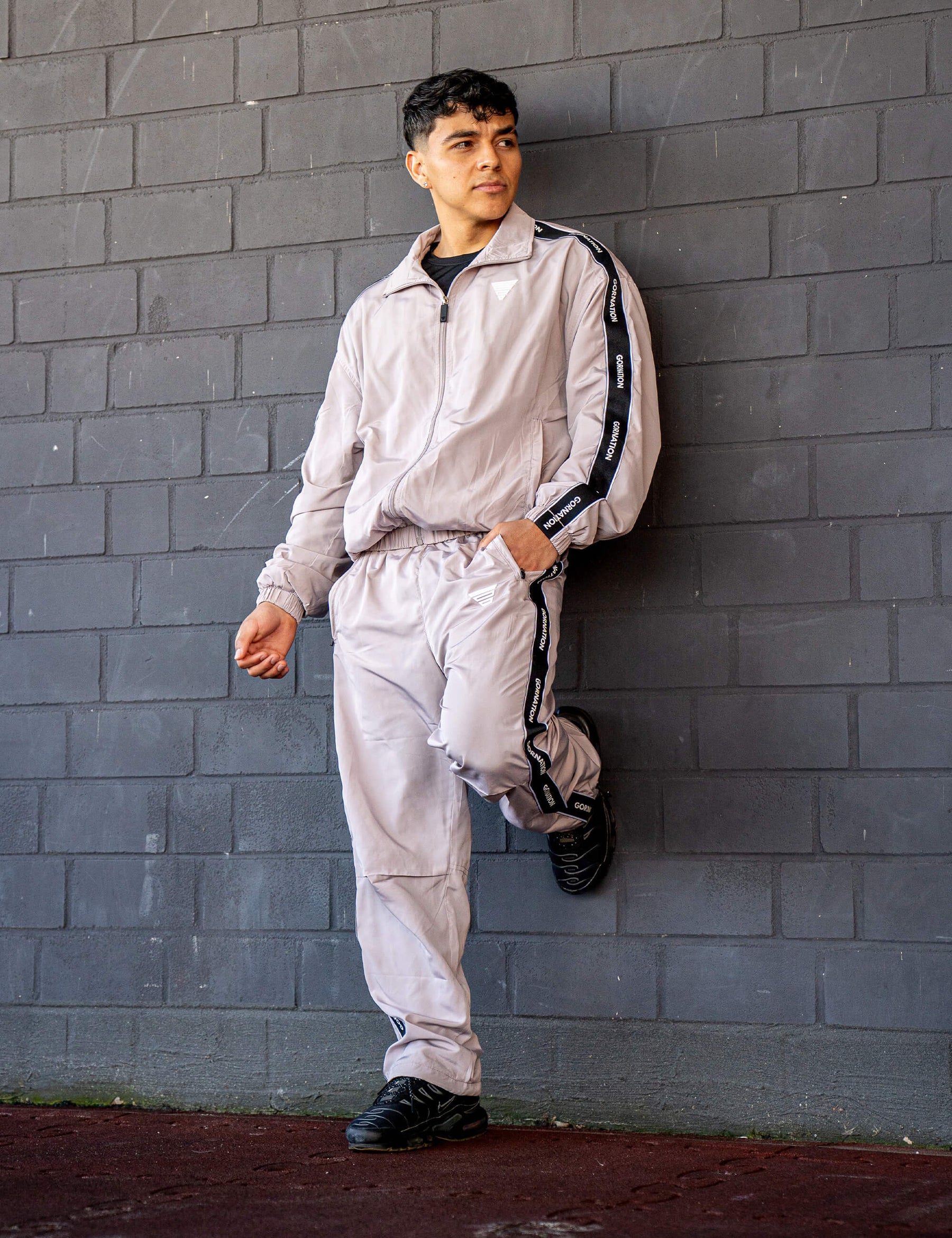 GORNATION athlete wearing the GORNATION tracksuite in grey