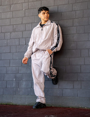 GORNATION athlete wearing the GORNATION tracksuite in grey