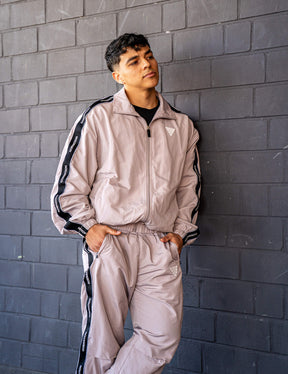 GORNATION athlete wearing the GORNATION tracksuite in grey