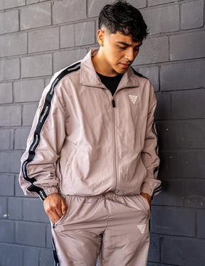 GORNATION athlete wearing the GORNATION tracksuite in grey