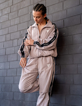 GORNATION athlete wearing the GORNATION tracksuite in grey