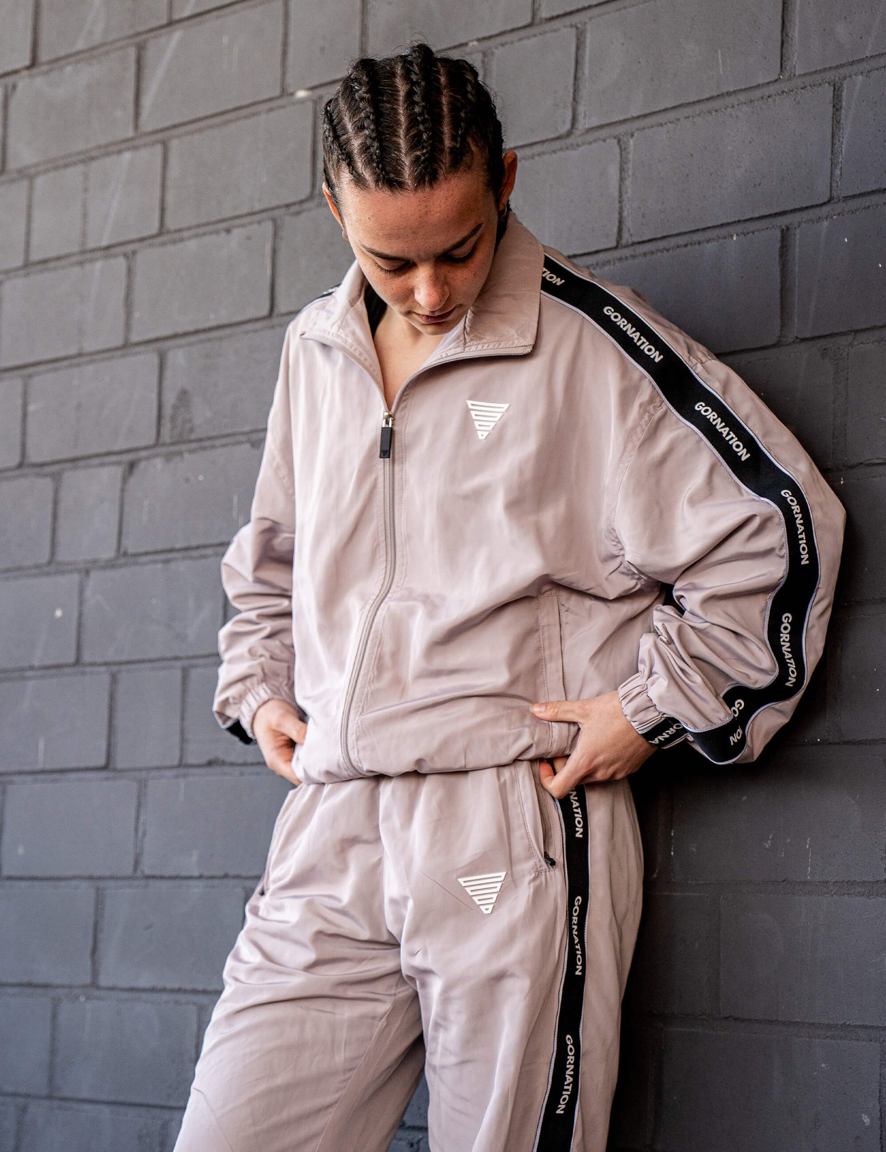 GORNATION athlete wearing the GORNATION tracksuite in grey