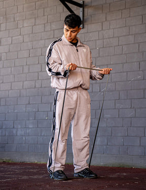 GORNATION athlete wearing the GORNATION tracksuite in grey