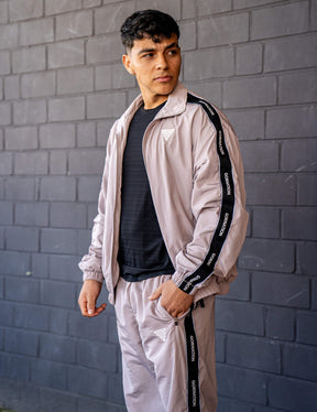 GORNATION athlete wearing the GORNATION tracksuite in grey