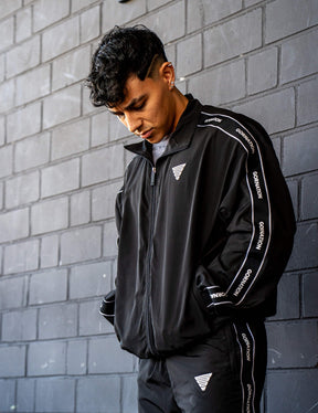GORNATION athlete wearing the GORNATION tracksuite jacket in black