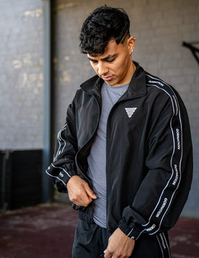 GORNATION athlete wearing the GORNATION tracksuite jacket in black