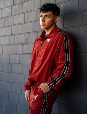 GORNATION athlete wearing the GORNATION tracksuite in red