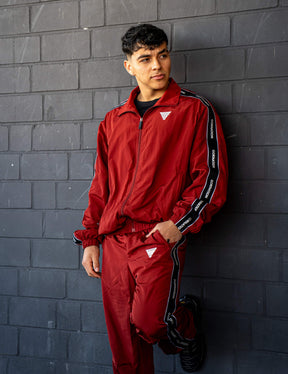 GORNATION athlete wearing the GORNATION tracksuite in red