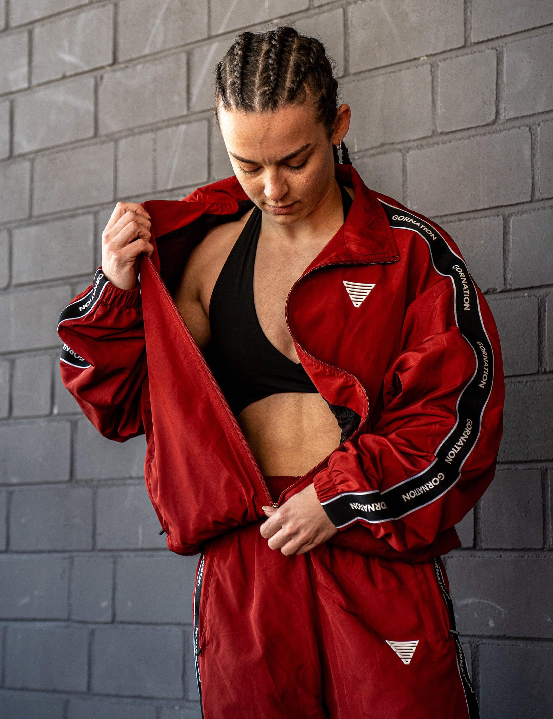 GORNATION athlete wearing the GORNATION tracksuite in red