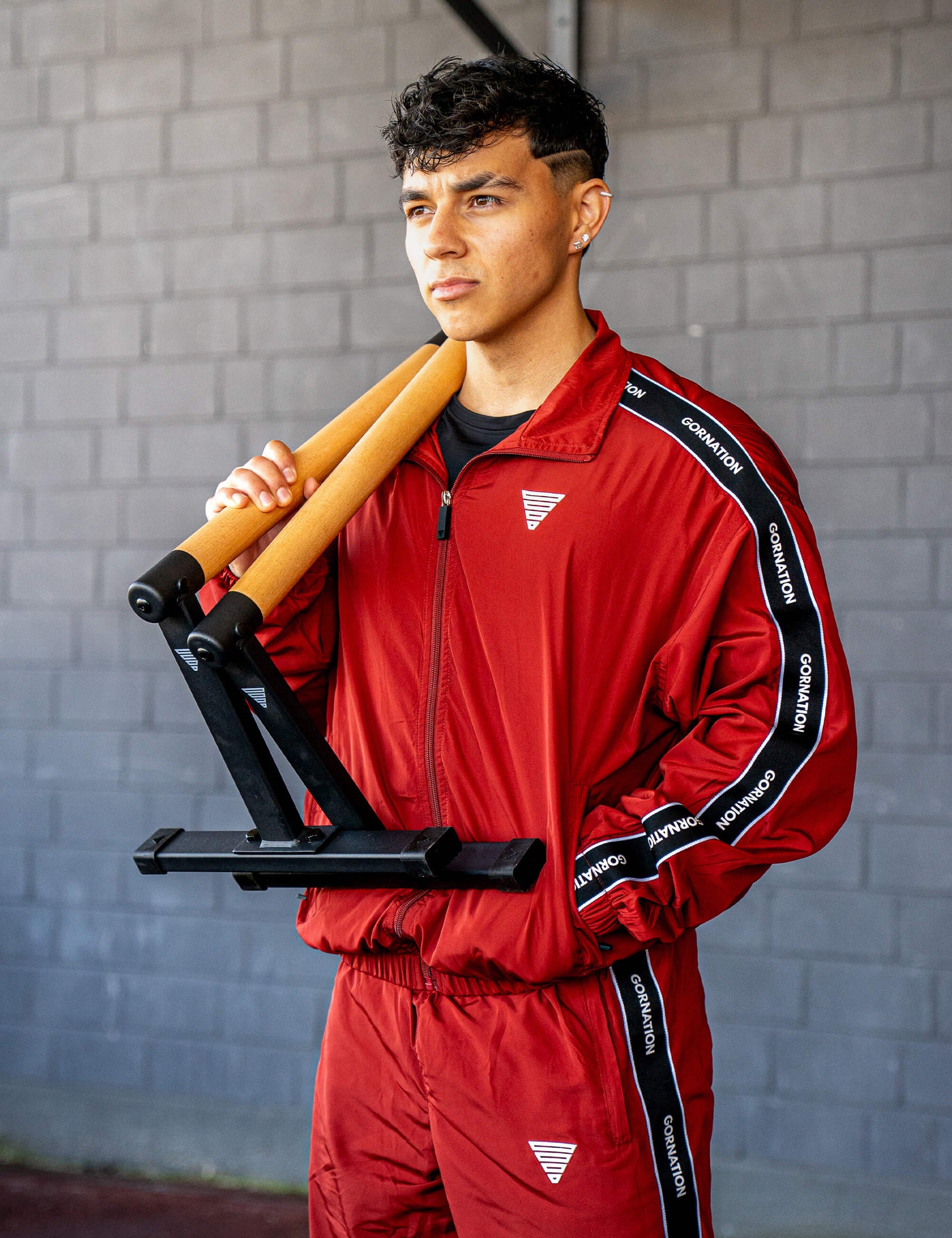 GORNATION athlete wearing the GORNATION tracksuite in red