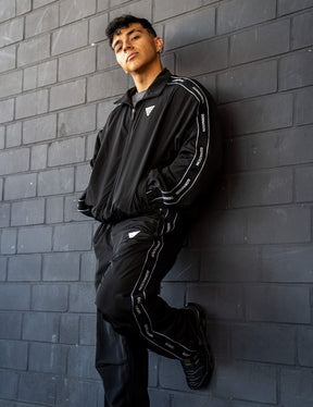 GORNATION athlete wearing the GORNATION tracksuite in black