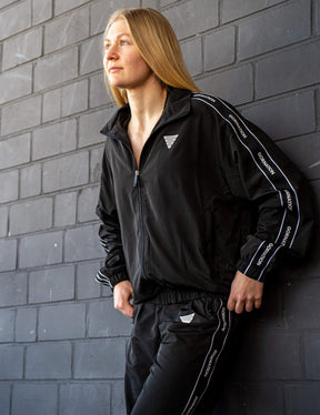 GORNATION athlete wearing the GORNATION tracksuite in black