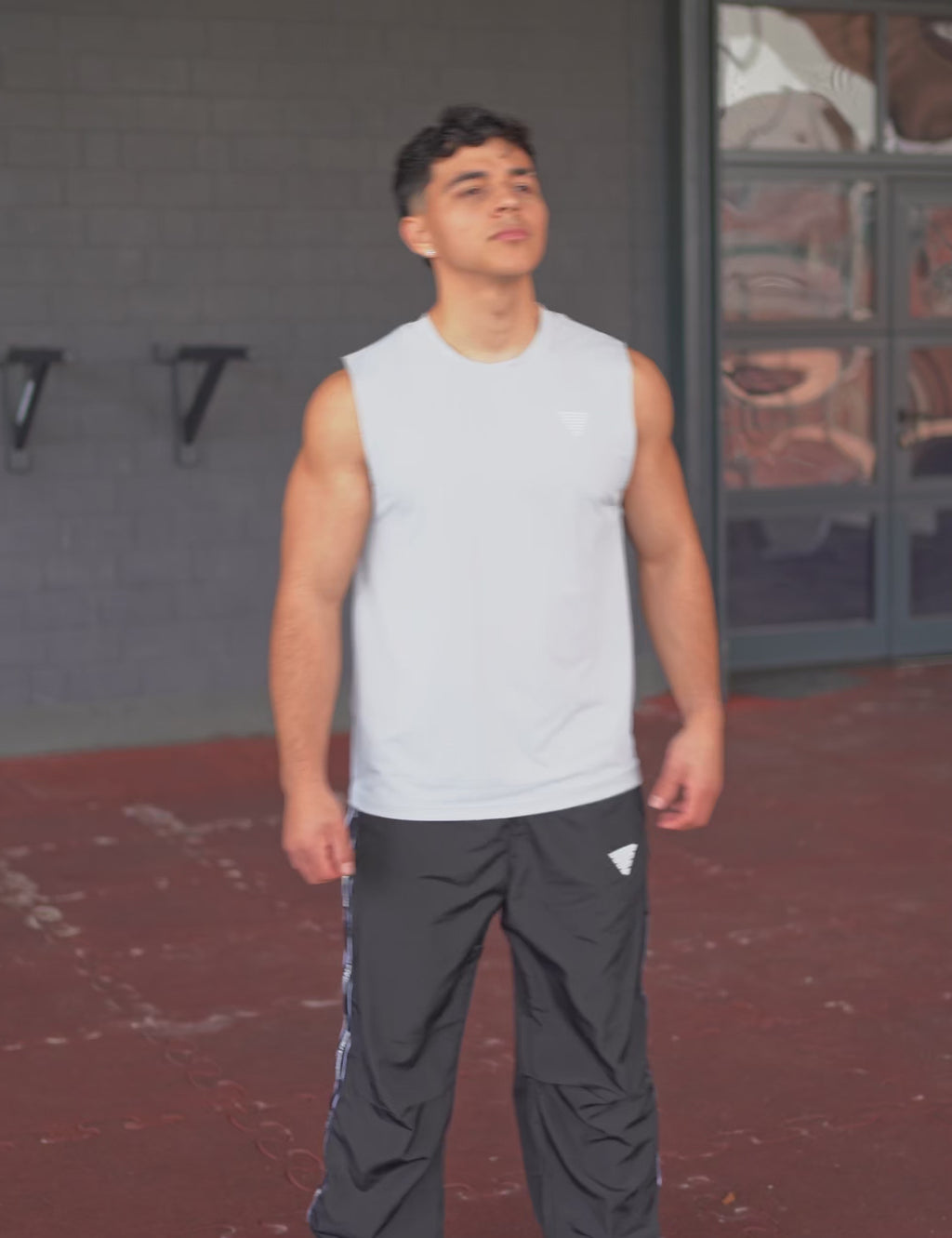 GORNATION athlete wearing the GORNATION active tank top in grey