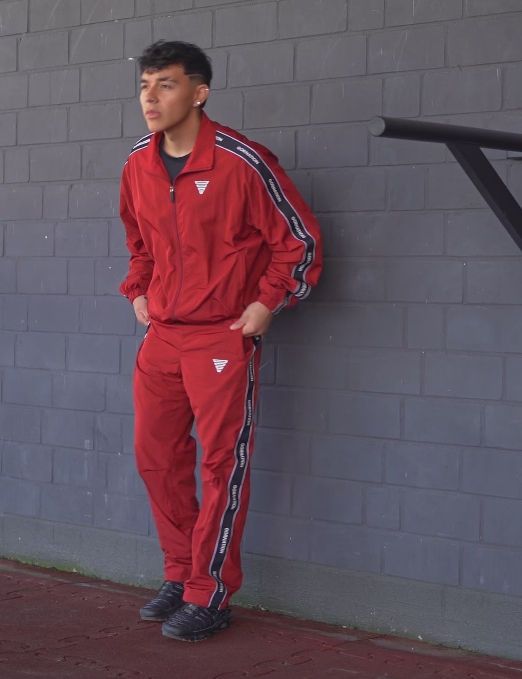 GORNATION athlete wearing the GORNATION tracksuite in red