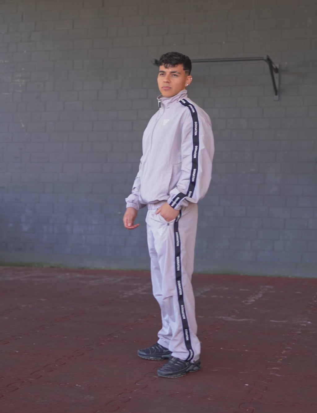 GORNATION athlete wearing the GORNATION tracksuite in grey