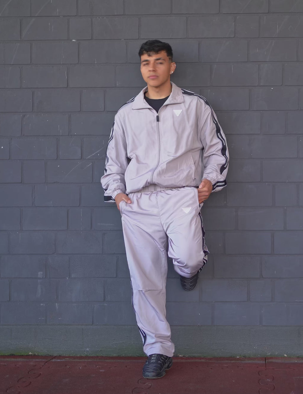 GORNATION athlete wearing the GORNATION tracksuite in grey