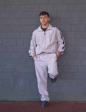 GORNATION athlete wearing the GORNATION tracksuite in grey